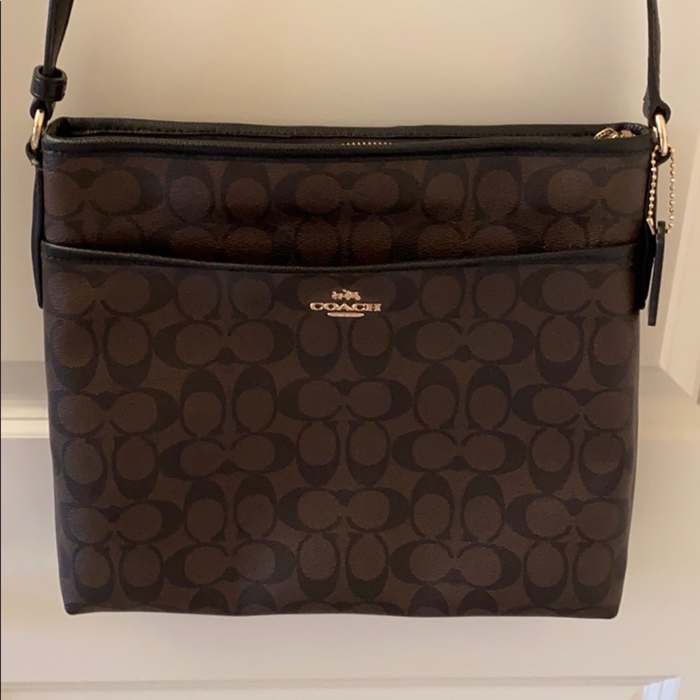 Coach cross body purse, never used